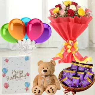 Bunch of 12 mix roses,  6 inch teddybear, Basket of  dairy milk chocolates, birthday  greeting card with 5 blown balloons 