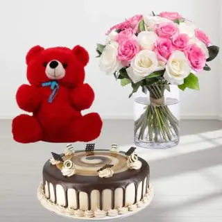 Vase arrangement of pink and white roses with irish coffee cake with 6 inch teddybear 