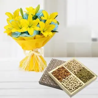 Bunch of 8 yellow lilies with box of half kg assorted dryfruits