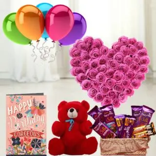 Heart shape arrangement of 50 pink roses, 6 inch teddybear, Basket of 7  dairy milk silk chocolates with 2  Fivestar, birthday greeting card with 5 blown balloons