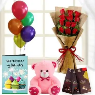 Bunch of 15 red roses with jute packing, 6 inch pink teddy bear,  3 bournville dark chocolate, birthday Greeting card with 5 blown balloons 