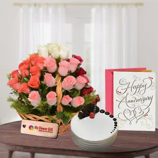 Basket Arrangement of 30 mix color roses with half kg vanilla fresh cream cake with anniversary card 