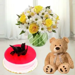 Mix flowers in glass vase with strawberry cool cake with 6 inch height teddybear 