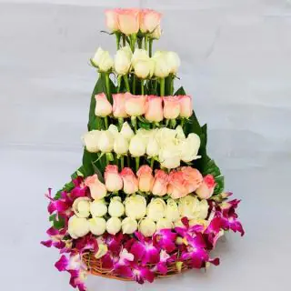 50 pink and white roses arrangement with 5 lavender orchids  