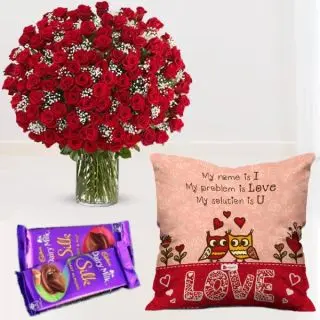 50 red roses arranged in glass vase , set of 2 dairy milk silk ,with photo cushion 