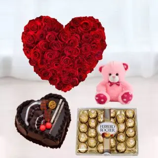50 red roses heart shape arrangement, 24 pcs rocher ferrero chocolates, heart shape chocolate truffle cake, 6 inch pink teddy bear 