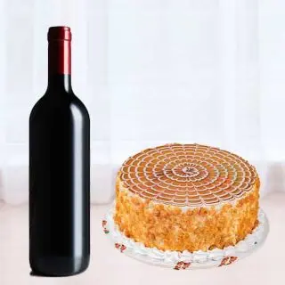 1 kg butterscotch cake with bottle  of red wine