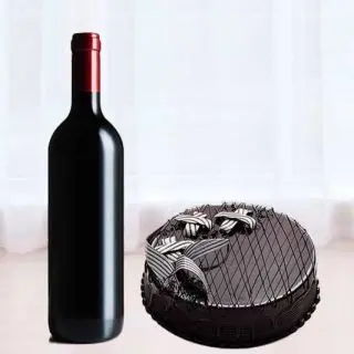 1 kg black forest cake with bottle of red wine