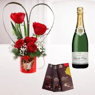 5 red roses arranged in photo mug, Bottle of champagne with set of 3 bournville chocolates 
