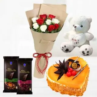 Bouquet of 10 Red and white roses with heart shape mango cake with 6 inch teddybear with pair of 2 bournville chocolates 