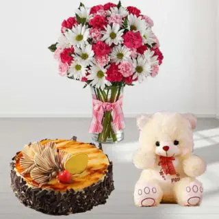 20 Mix flowers in glass vase with 1 feet height teddybear with irish coffee cake 