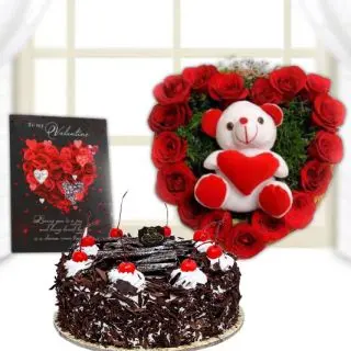 6 inch teddy in heart shape arrangement of 15 red roses, half kg black forest cake, valentine card 