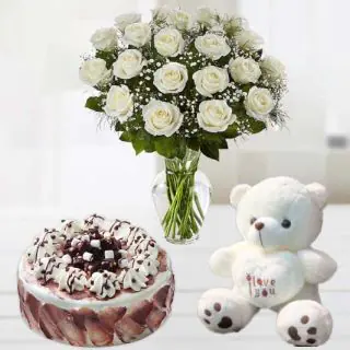 Beautiful vase arrangement of 20 white roses with choco vanilla cake with 6 inch teddybear 