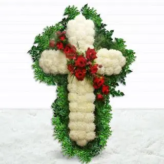 1 feet height cross of white crysanthemums and red roses in centre