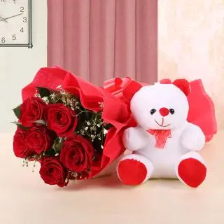 8 red roses with special packing with 6 inch cute teddy bear 