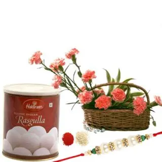 A beautiful arrangement of 10 orange carnations with 1 kg rasgullas with 1 rakhi and roli chawal