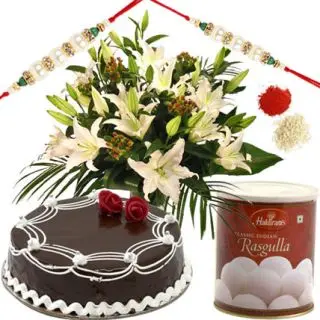 a beauutifl bouquet of 10 white asiatic lilies with 1 kg chocolate cake with 1 kg rasgullas with 1 rakhi and roli chawal