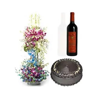 Arrangement Of Purple And Blue Orchids With 1 Kg Chocolate Cake And Indian Branded Wine