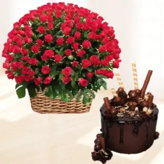 Basket arrangement of 100 red roses with chocolate explosion cool cake 