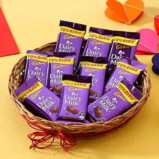 Basket Arrangement of 10 dairy milk chocolates 