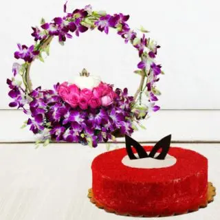 Basket arrangement of 10 Purple orchids, pink and white roses with red velvet cake
