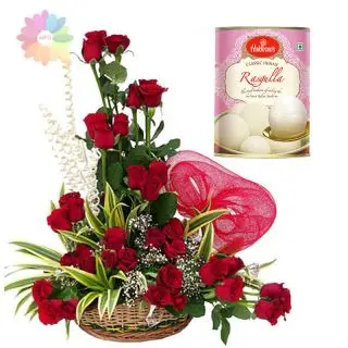 Basket arrangement of 30 red roses with 1 kg rasgullas from haldiram