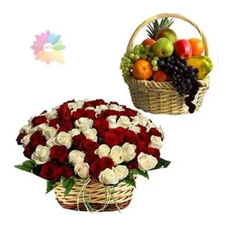 Basket arrangement of 50 red and white roses with 2 kg seasonal fruits basket 