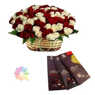 Basket arrangement of 50 red and white roses with 3 bournville dark chocolates