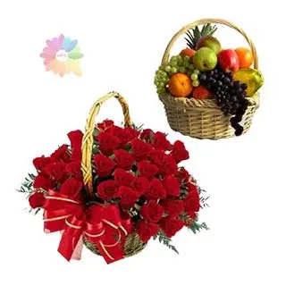 Basket arrangement of 50 red roses with 3 kg seasonal fruit basket