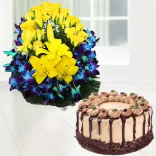 Basket Arrangement of blue orchids with yellow lilies and roses with chocolate cake 