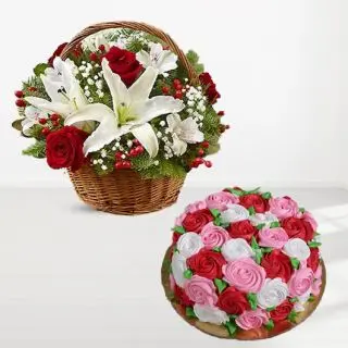 Basket arrangement of red roses with white lilies, Half kg vanilla cake with floral topping 