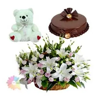 Basket arrangement of white lilies &pink roses with double chocolate cake with 1 feet height teddy bear