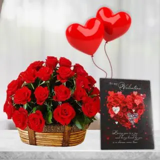 Basket of 15 red roses with valentine day greeting card with pair of heart shape balloons 