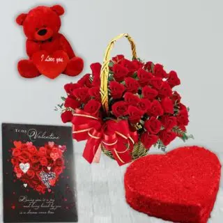 basket of 20 red roses, half kg heart shape red velvet cake, valentine card, with 6 inch red teddybear 