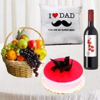 basket of 2 kg assorted seasonal fruits basket, half kg strawberry cake, bottle of wine with photo cushion 