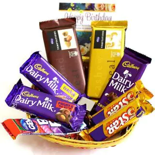 Basket of 2 temptations, 3 dairy milk , 2 fivestar, 1 gems, with occassional greeting card 