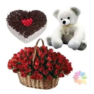Basket of 50 red roses with heart shape black forest cake with 2 feet height teddy bear