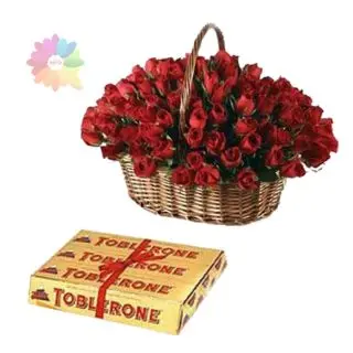 Basket  of 50 red roses with 3 pcs toblerone chocolates