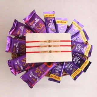 Basket of 5 dairy milk silk, 10 dairy milk chocolates with set of 3 rakhi 