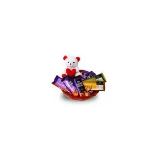 basket of 5 dairy milk silk with 3 temptations with a cute teddy bear with assorted home made chocolates