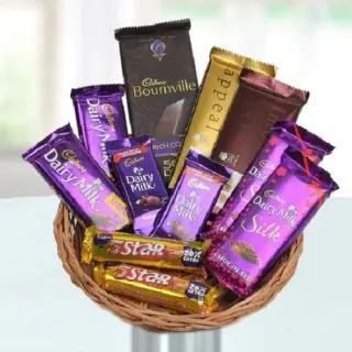 Basket of assorted chocolates including 2 dairy milk silk, 2 temptations, 1 bournville , 2 Fivestar ,4 dairy milk  