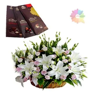 Basket of whitle lilies&pink roses with 3 bournville chocolates