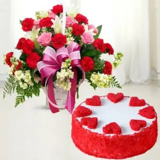 Basket arrangement of carnations and roses with red velvet cool cake 