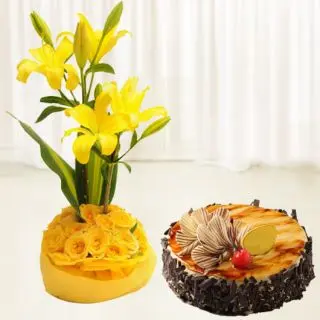 Beautiful Arrangement of 10 yellow roses with 2 yellow lilies with Irish chocolate cake 