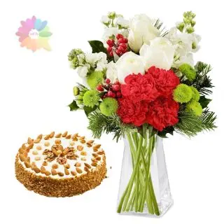 Beautiful arrangement of red carnations with white roses in glass vase with 1 pound vanilla almond cake