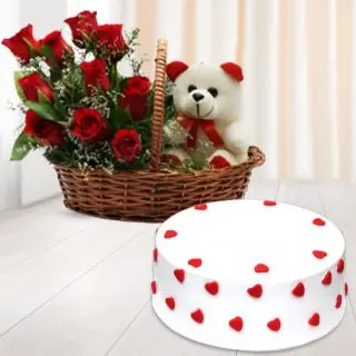 Beautiful Basket Arrangement of 15 red roses with 6 inch teddy bear sitting in it with vanilla cool cake