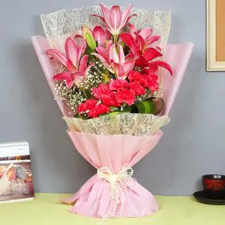 Beautiful bouquet of 10 pink carnations with 3 pink lilies 