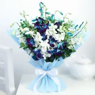 Beautiful Bouquet  of white and blue orchids with special packing 