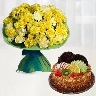 Beautiful Bunch of  20 yellow carnation with 20 yellow daisies with butterscotch fruit cake 
