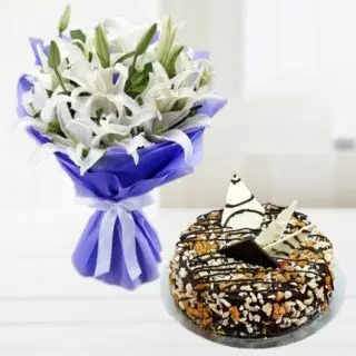 Beautiful bunch of 5 white lilies with half kg chocolate walnut cake 